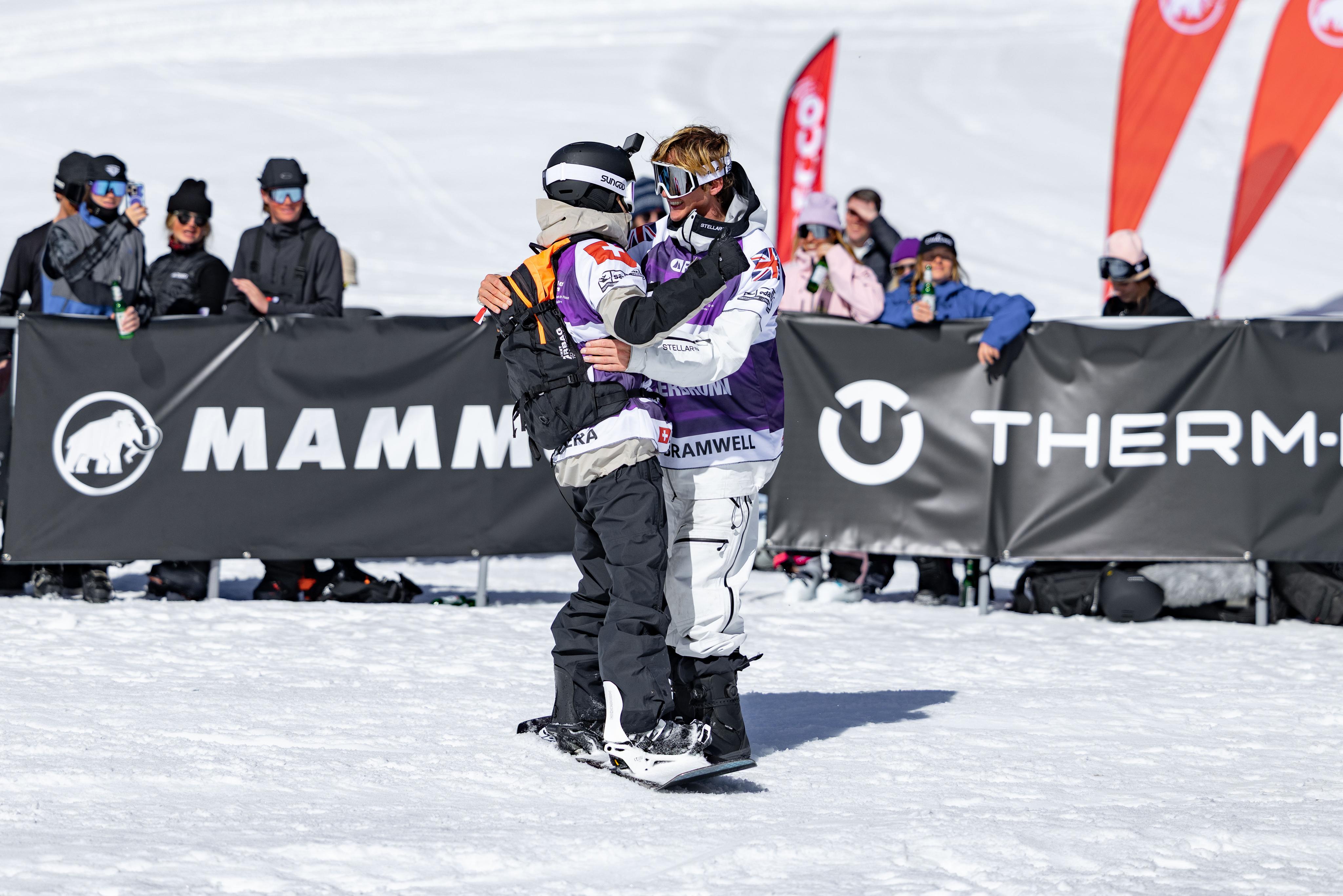 A skier wearing Mammut ski gear, including Mammut reflective goggles and a helmet, looks down with intense focus.