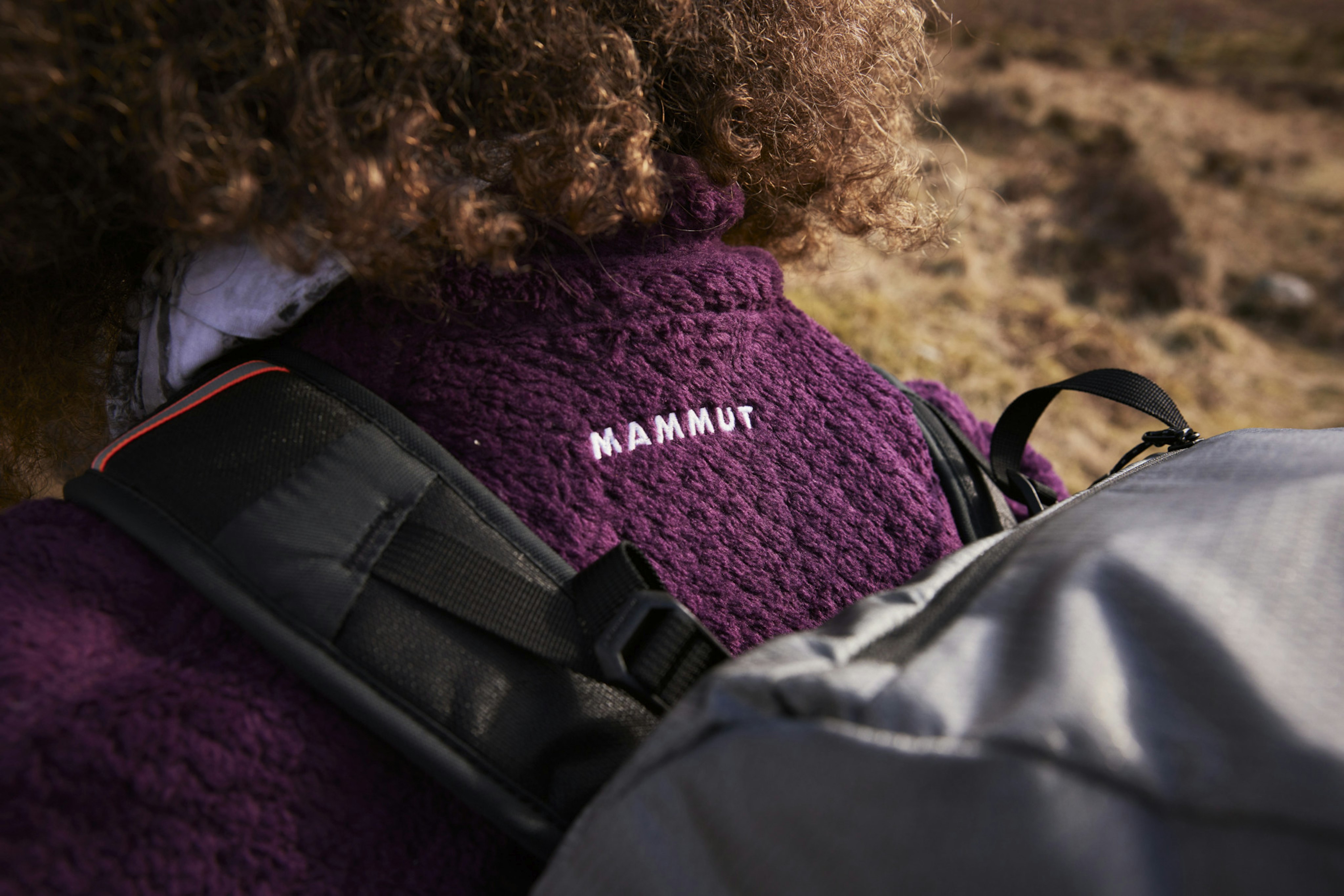 Woman in purple Mammut jacket