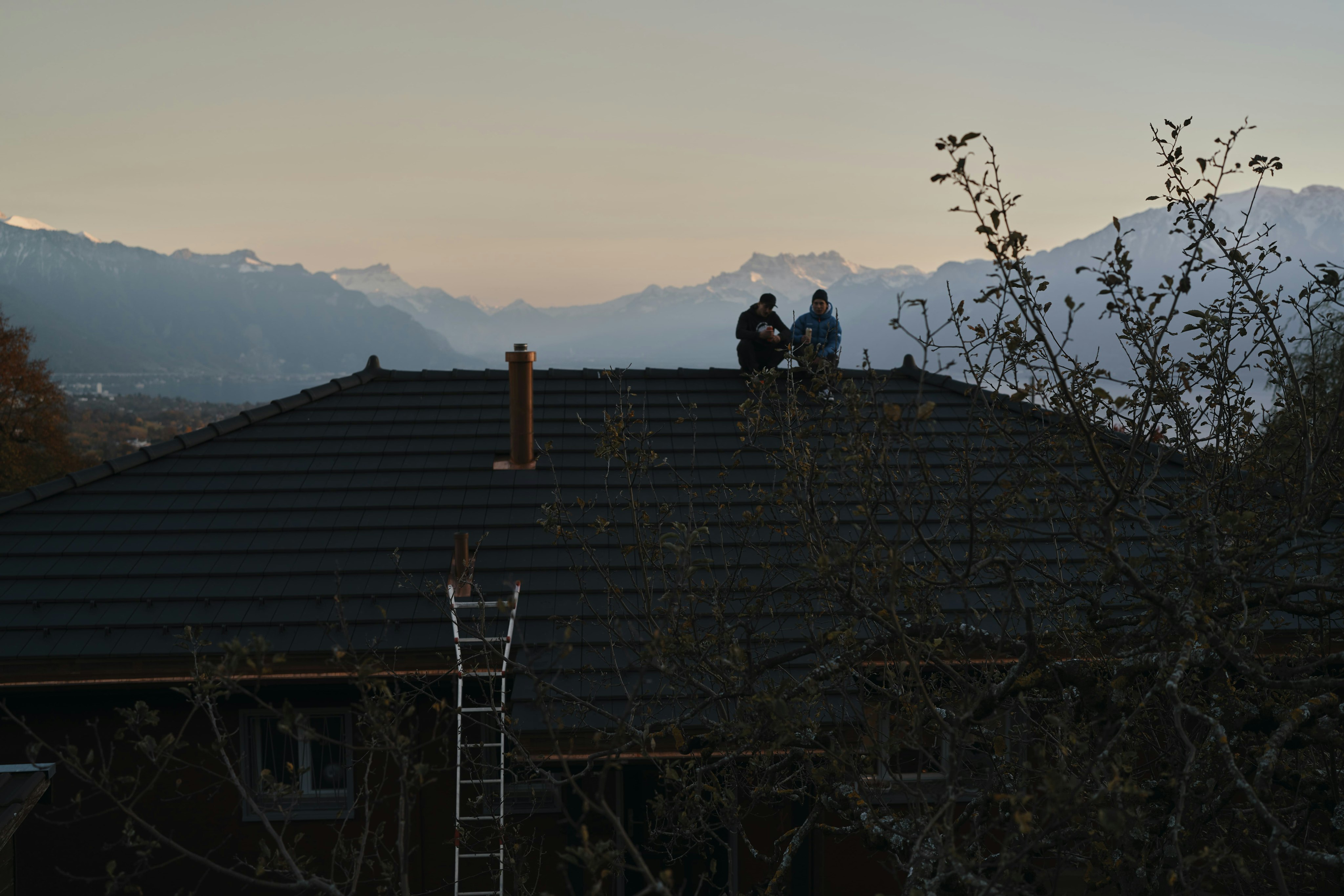 Two men on the roof 