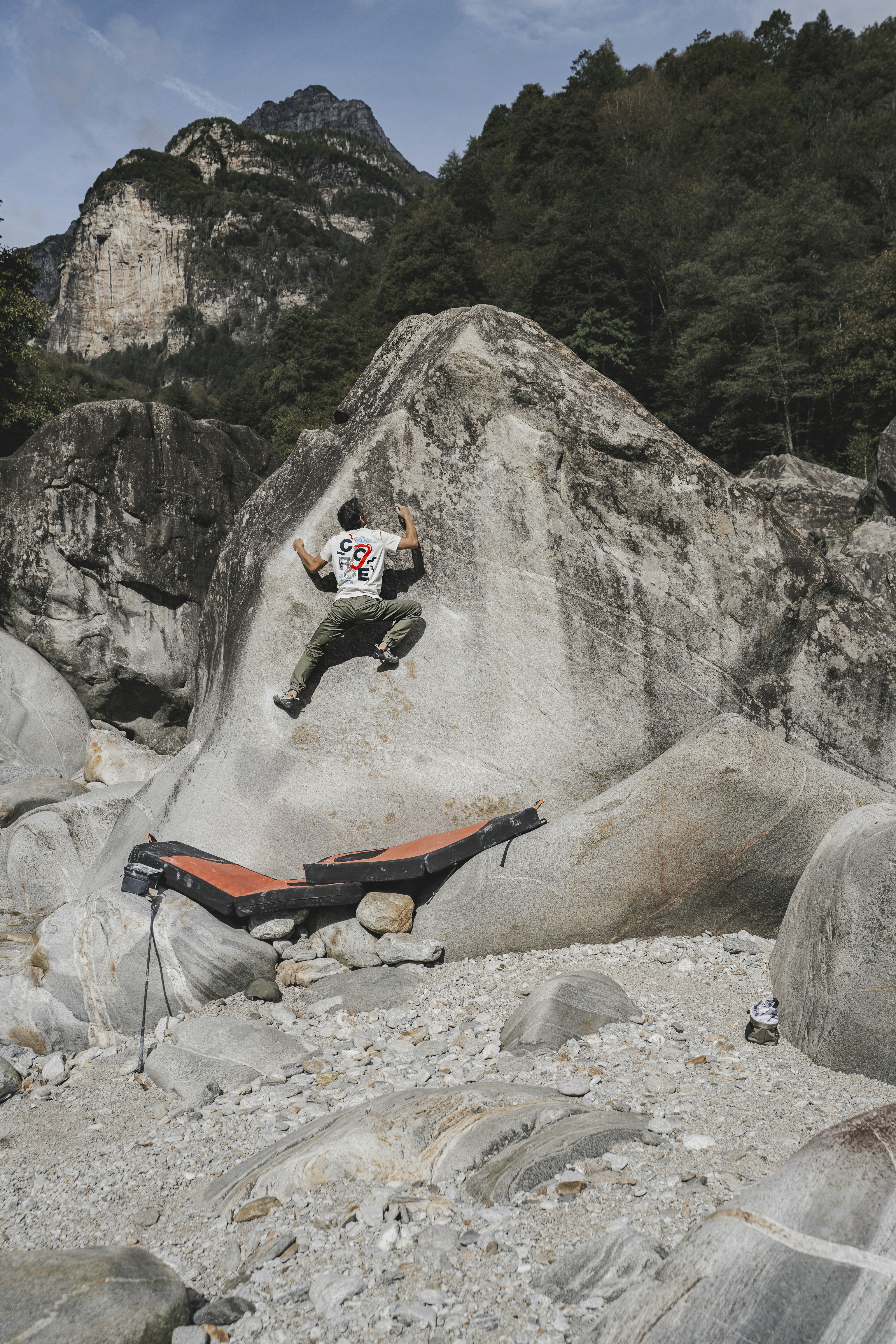 Man climbs on a rock.