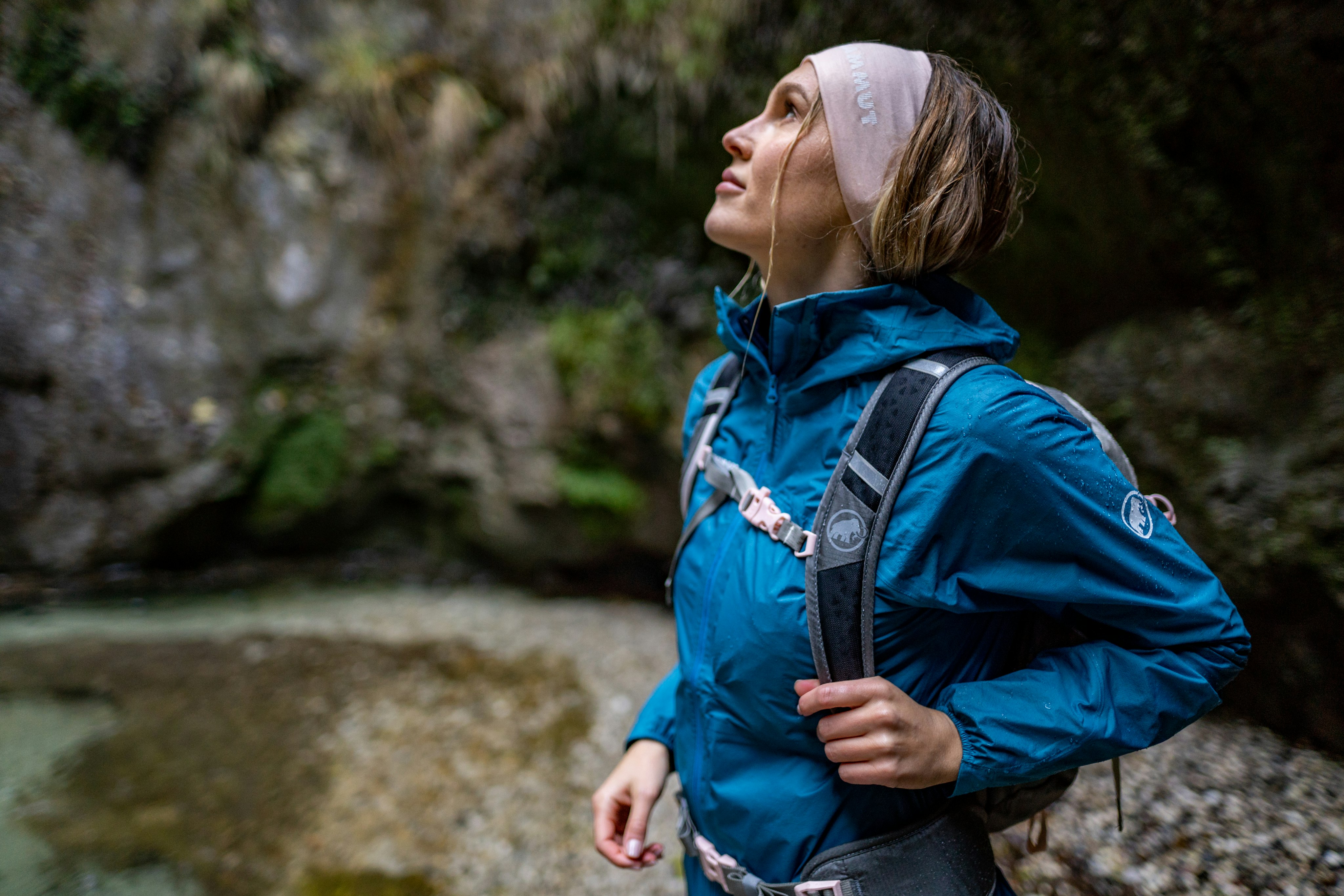 Woman in nature with hiking backpack 