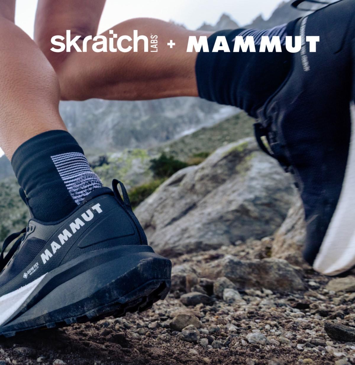 Close-up of a runner's Mammut trail running shoes on a rocky path, with "Skratch Labs + Mammut" logo featured above.