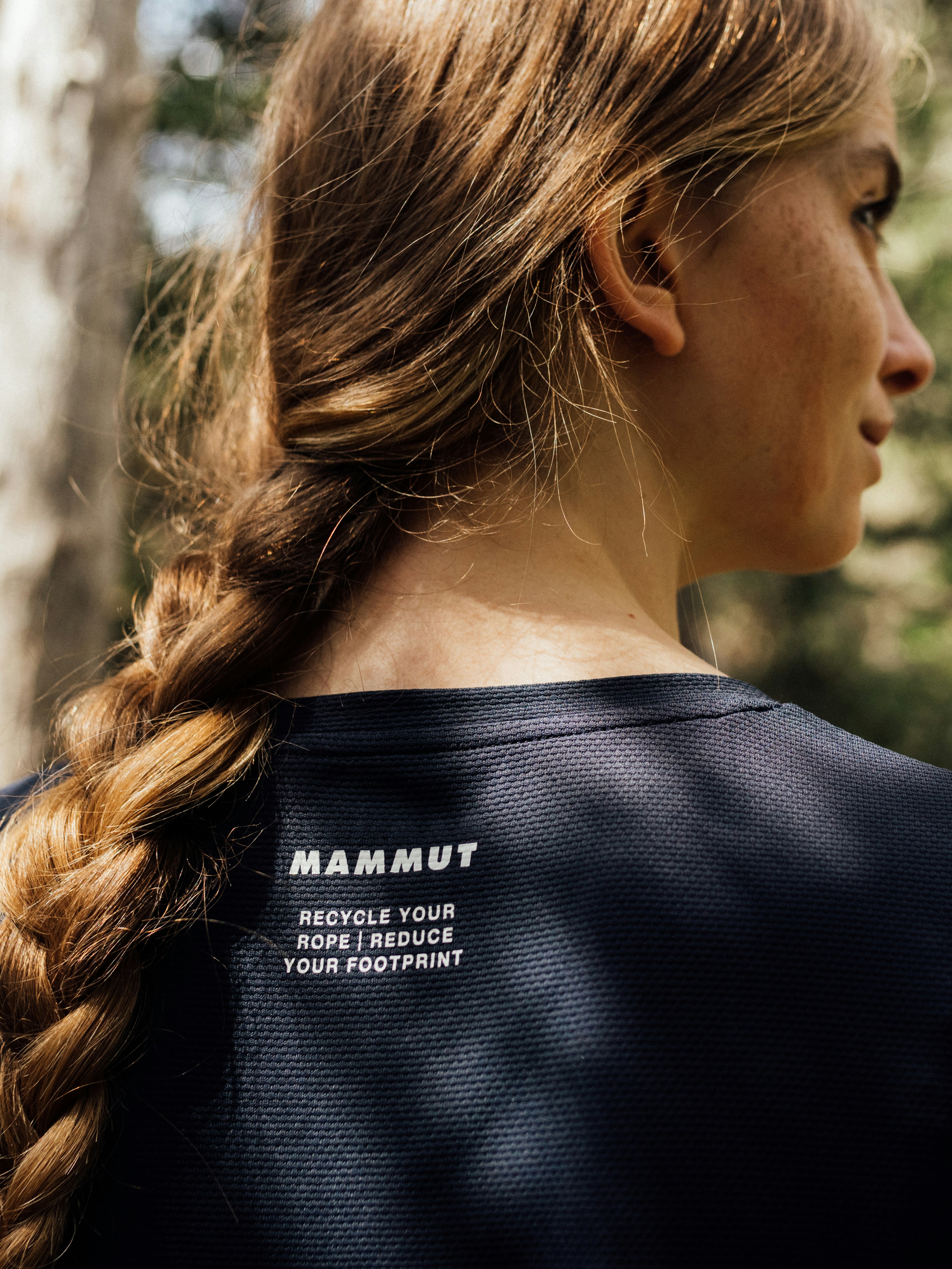 Woman in Mammut t-shirt.